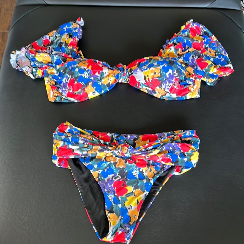 Size S Beach Riot Bikini. Multi color floral pattern.